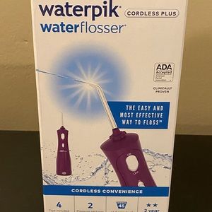 Waterpik Water Flosser Cordless Plus NIB (Purple)